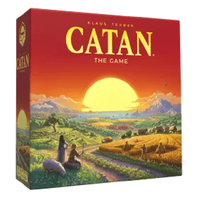 Pudełko gry planszowej Catan z ilustracją krajobrazu i wsi.